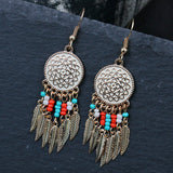 Alloy disc engraved rose earrings