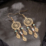 Alloy disc engraved rose earrings