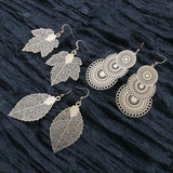Golden geometric leaf copper earrings