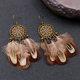 Feather round hollow retro earrings