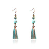 Fashion hollow carved alloy tassel earrings