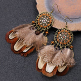 Feather round hollow retro earrings