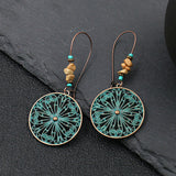 Exaggerated engraved bronze metal earrings