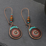 Exaggerated engraved bronze metal earrings