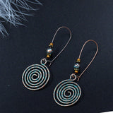 Exaggerated engraved bronze metal earrings