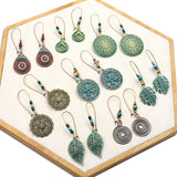 Exaggerated engraved bronze metal earrings