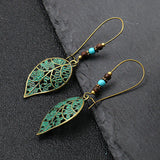 Exaggerated engraved bronze metal earrings