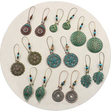 Exaggerated engraved bronze metal earrings