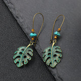 Exaggerated engraved bronze metal earrings