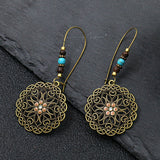 Exaggerated engraved bronze metal earrings