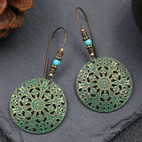 Exaggerated engraved bronze metal earrings