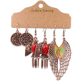 Fashion owl wing earrings