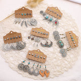 Leaf wing geometric tassel earrings
