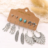 Leaf wing geometric tassel earrings