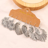 Retro inlaid flower openwork earrings