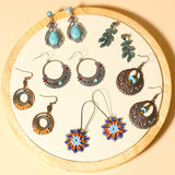 Leaf drop-shaped handmade rice beads woven turquoise earrings