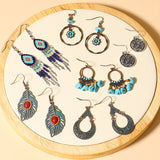 Leaf drop-shaped handmade rice beads woven turquoise earrings