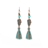 Fashion hollow carved alloy tassel earrings