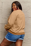 Momentlover Simply Love Full Size SANTA'S FAVORITE Round Neck Sweatshirt