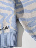 Momentlover Printed V-Neck Long Sleeve Sweater