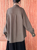 Momentlover Split-Joint Solid Color Pleated Buttoned Asymmetric Loose Long Sleeves High Neck Blouses