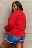 Momentlover Simply Love Full Size SANTA'S FAVORITE Round Neck Sweatshirt
