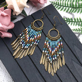 Creative beaded tassel stylish round openwork earrings