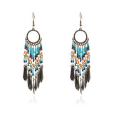 Creative beaded tassel stylish round openwork earrings