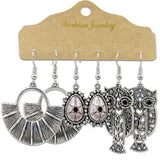 Irregular silver butterfly tassel earrings