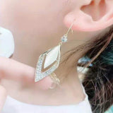 Geometric long diamond earrings