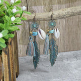 Irregular leaves hollowed out turquoise earrings