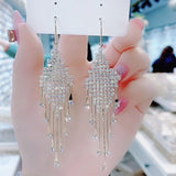 Geometric diamond tassel earrings