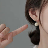Round pearl-set earrings