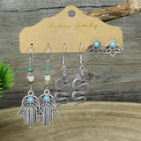 Irregular silver butterfly tassel earrings
