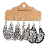 Snow tassel love wing earrings