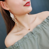 Geometric diamond tassel earrings