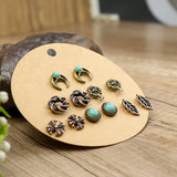 Turquoise heart-shaped flower Christmas tree earrings