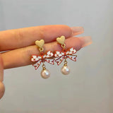Coffee-colored bow temperament pearl earrings
