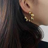 S925 silver needle niche design twisted metal earrings