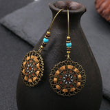 Round openwork bohemian earrings