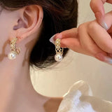 S925 silver needle simple inlaid hollow pearl earrings
