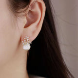 S925 silver needle Korean cat's eye petal earrings