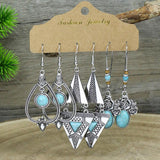 Irregular silver butterfly tassel earrings