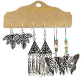 Irregular silver butterfly tassel earrings