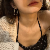 Broken silver love earrings