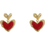 Simple and small red love earrings