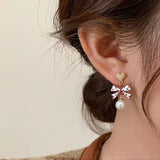 Coffee-colored bow temperament pearl earrings