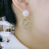 Geometric diamond-shaped pearl S925 silver pin letter earrings