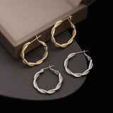 S925 silver needle twist design earrings