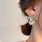 French romantic bouquet with pearl earrings